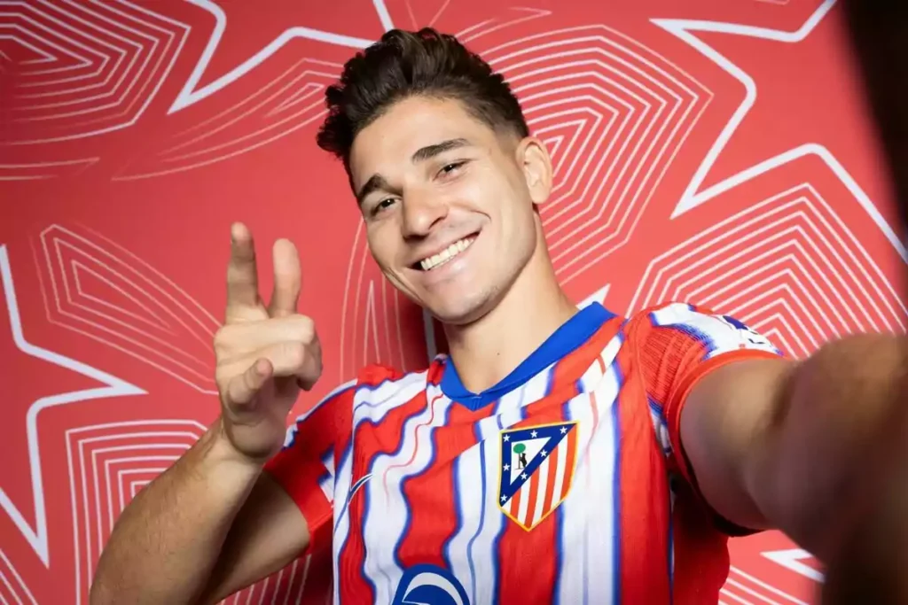 Julian Alvarez posing after recent transfer from Premier League club Manchester City to La Liga club Atletico Madrid