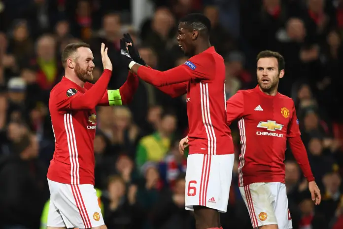 MANCHESTER, ENGLAND - MAY 21: Wayne Rooney of Manchester United applauds the fans alongside, left to right, Jesse Lingard, Paul Pogba and Daley Blind after the Premier League match between Manchester United and Crystal Palace at Old Trafford on May 21, 2017 in Manchester, England.