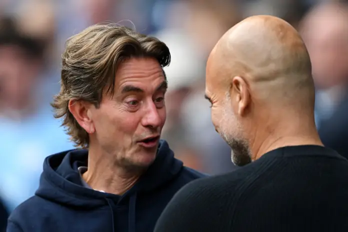 MANCHESTER, ENGLAND - SEPTEMBER 14: Thomas Frank, Manager of Brentford, interacts with Pep Guardiola, Manager of Manchester City, prior to the Premier League match between Manchester City FC and Brentford FC at Etihad Stadium on September 14, 2024 in Manchester, England.